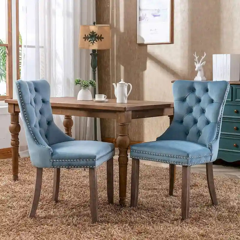 Chaise de salle à manger capitonnée en velours avec pieds en bois cloutés