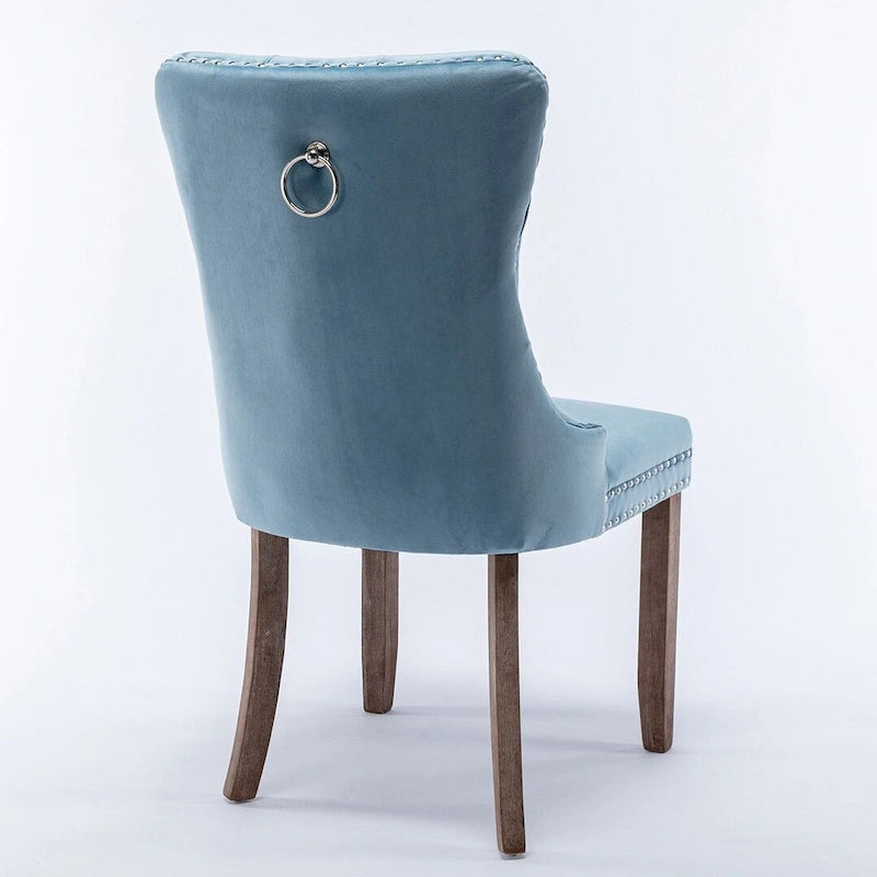 Chaise de salle à manger capitonnée en velours avec pieds en bois cloutés