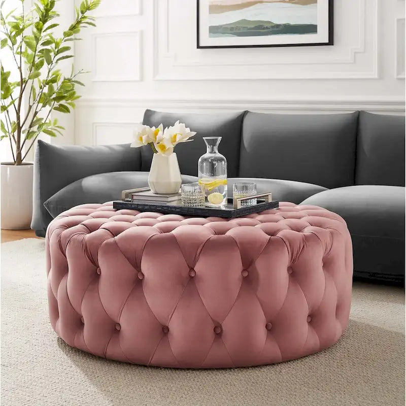 Grand pouf rond capitonné en velours performance