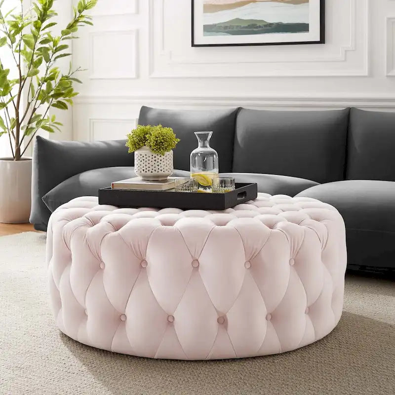 Grand pouf rond capitonné en velours performance