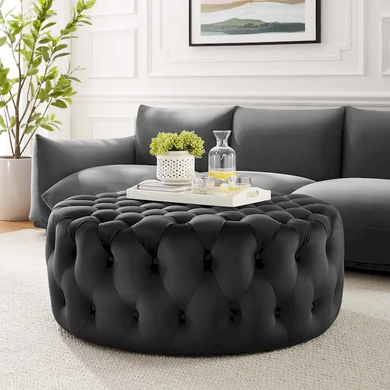 Grand pouf rond capitonné en velours performance