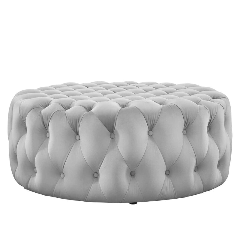 Grand pouf rond capitonné en velours performance