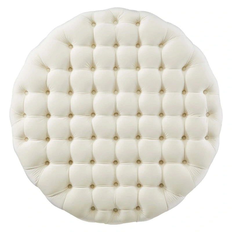 Grand pouf rond capitonné en velours performance